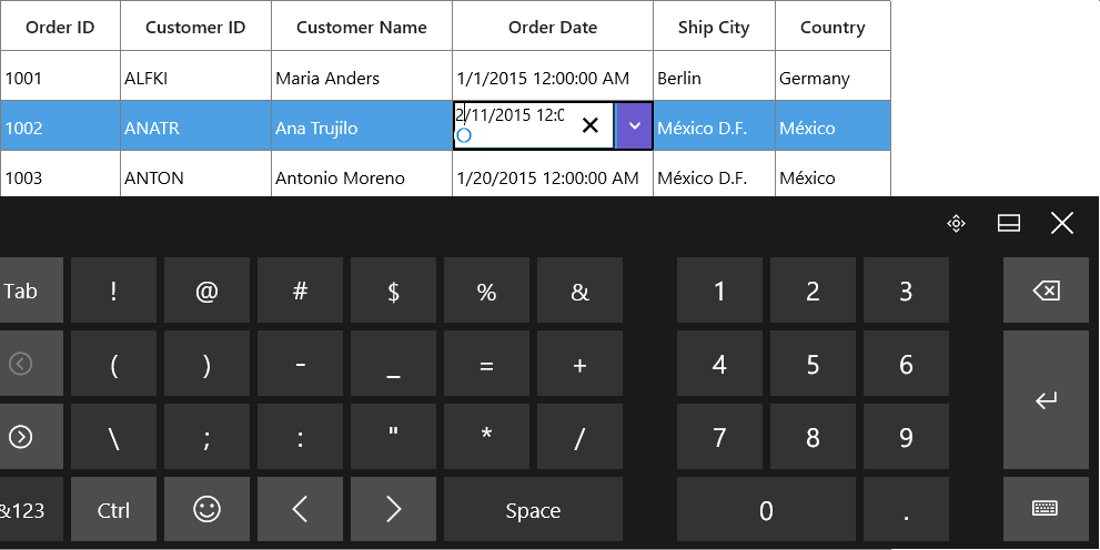 Displaying editing in GridDateTimeColumn with On-Screen keyboard in Desktop view of UWP SfDataGrid